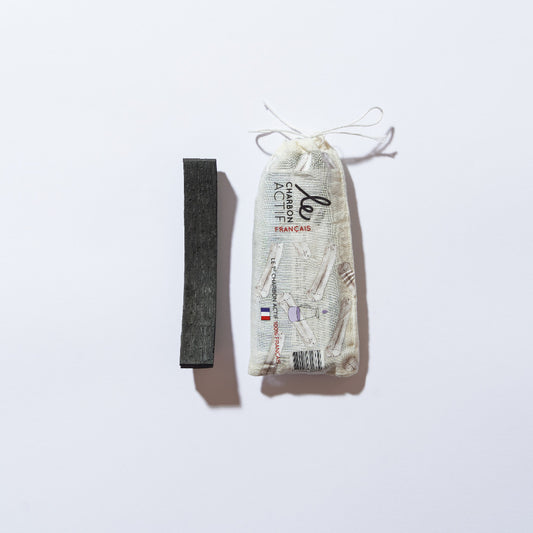 BIJIN charcoal filter replacement for glass water carafe in a small cloth pouch